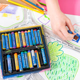 Child’s hand drawing a colourful map scene with oil pastels, beside an open box of Zart oil pastels, showing bright colours, layered marks, and creative use on paper.