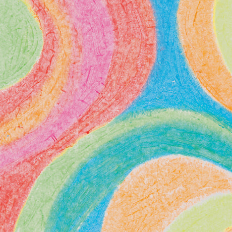 A close-up sample artwork showing broad sweeping curves in fluorescent oil pastel colours across textured paper. Bands of orange, pink, red, blue, teal, and green overlap and blend where they meet, revealing the waxy, layered quality of the marks and the vibrancy of the fluorescent pigments.