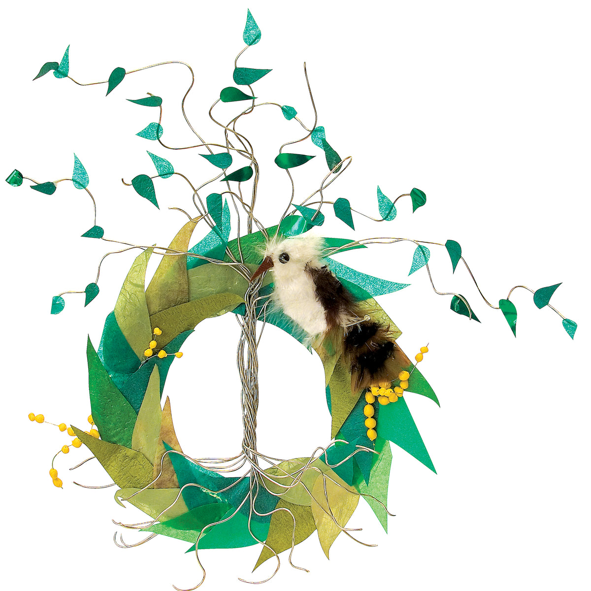 A circular wreath layered with green and yellow-green paper leaves, wrapped with silver wire. Curling wire stems rise upward, each tipped with small green paper leaves. A small white and brown feathered bird perches near the top, with clusters of tiny yellow beads scattered around the ring.