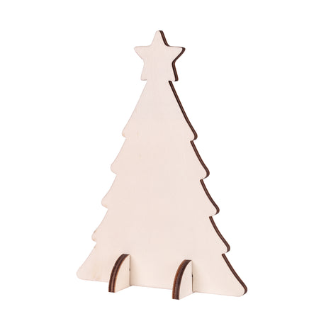 A single Zart Wooden Standing Tree cut-out in plain plywood, standing upright against a white background with a star at the top and tiered branch edges. The pale untreated surface shows a visible grain and dark cut edges, held upright by two small slotted feet.