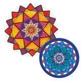 Two round painted artworks overlapping, each featuring a symmetrical radiating pattern built from repeated triangles and petal shapes. The larger piece uses warm reds, oranges and purples with white linework, while the smaller uses cool blues, teals and purples, both finished in bold, richly saturated colour.