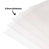A fanned stack of transparent Zart Acetate Heavyweight Sheets on a white background, annotated "0.5mm thickness" with an arrow pointing to the layered edges. The clear sheets overlap to show their thin, flexible form and see-through quality.