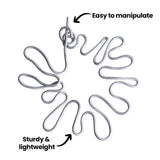Coiled Armature Wire arranged in a circular formation on a white background. On-image text reads Easy to manipulate and Sturdy & lightweight with arrows pointing to the smooth, silver wire to highlight its flexibility and strength.