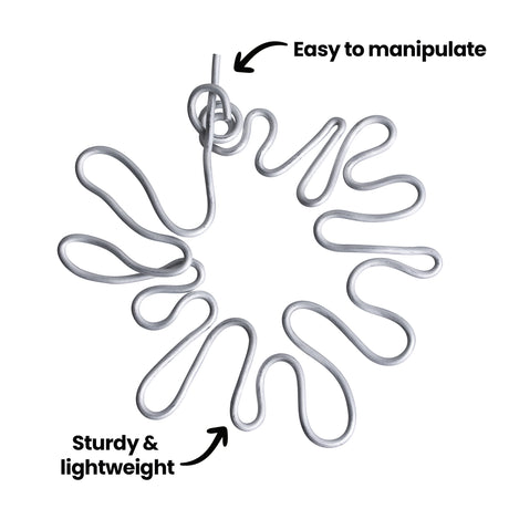 Coiled Armature Wire arranged in a circular formation on a white background. On-image text reads “Easy to manipulate” and “Sturdy & lightweight” with arrows pointing to the smooth, silver wire to highlight its flexibility and strength.