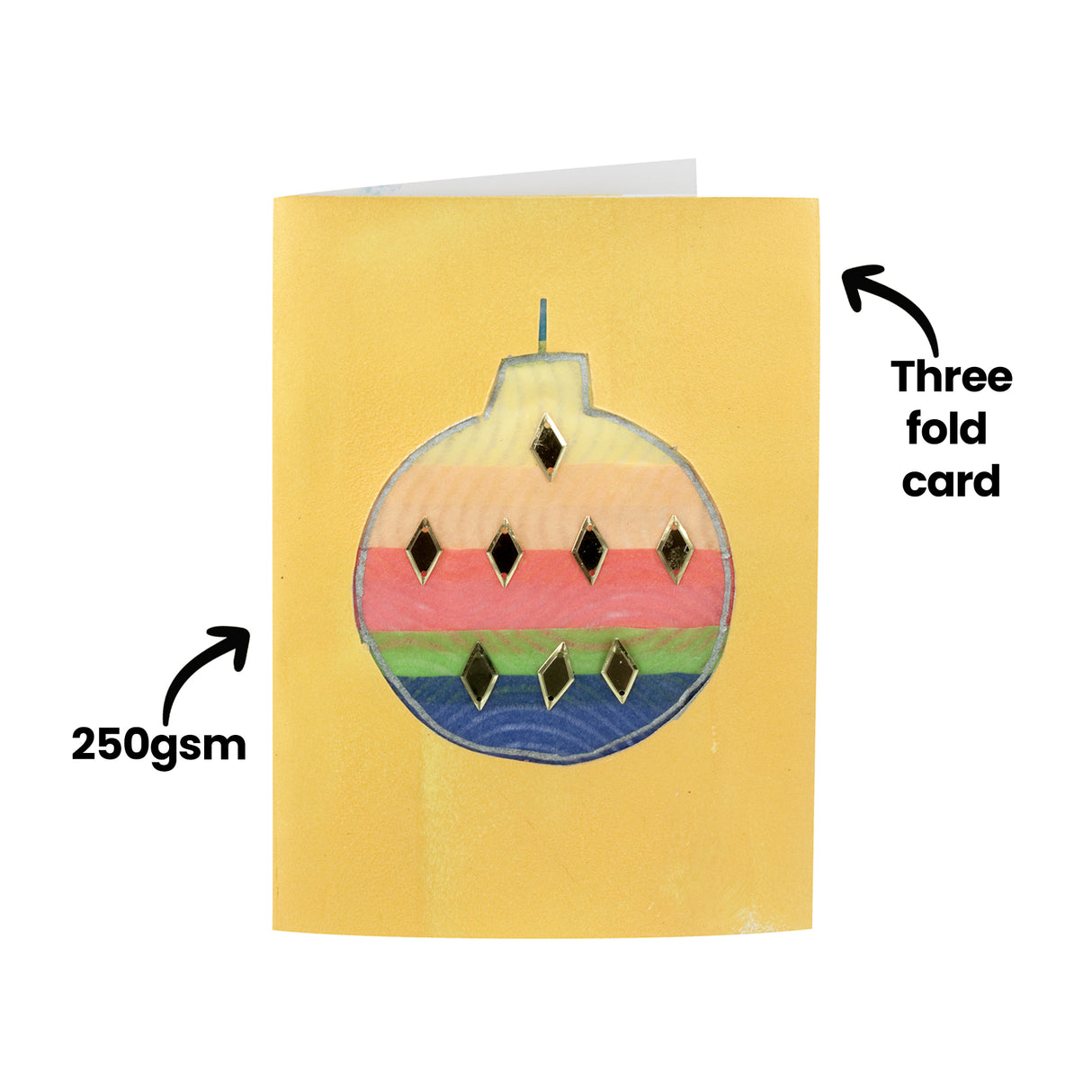 A decorated sample made using a Zart Cards and Envelopes Xmas Cut-Outs card, backed with a rainbow-striped bauble drawing dotted with small gold gem accents, set against a yellow card front. Text overlays read "Three fold card" and "250gsm".