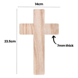 Plain wooden cross displayed with measurement annotations. Top width labelled "14cm", overall height marked "23.5cm", and thickness indicated by arrow reading "7mm thick". Light timber grain visible with rounded corners. Image clearly communicates scale and proportions for planning decoration, mosaic placement, or classroom craft activities.