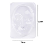 Clear plastic Mask Mould Male showing a raised three-dimensional male face with defined features including eyes, nose, and mouth on a rectangular base. Measurement annotations indicate 22cm height and 15cm width, displaying the mould's dimensions for creating face masks or decorative pieces.