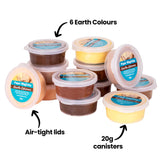 Assorted Paper Magiclay Earth Colours tubs arranged loosely. On-image annotations read 6 Earth Colours, Air-tight lids, and 20g canisters, with black arrows pointing to the tubs. Each clear container shows a different brown or yellow earth tone.
