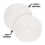 Two white circular loop fastener dots displayed side by side, showing contrasting textures—one soft and fuzzy, the other slightly rough with fine raised bumps. Annotation text reads “2.2cm diameter” and “Loop Fastener” with arrows pointing to each surface