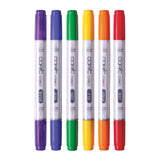 Copic Ciao Marker Set Primary Pack of 6 standing upright in a row, displaying colour codes BV08, B29, G07, Y15, YR04, and R37. Each marker features a white barrel with colour-coded caps and barrel ends in purple, blue, green, yellow, orange, and red, labelled "Medium Broad" and "Super Brush".
