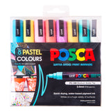 Pack of eight Uni POSCA Pastel Colours paint markers in a clear wallet. The pastel caps are visible at the top, and the packaging highlights the PC-5M medium bullet tip and examples of artwork created with the markers.