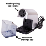The Ledah Electric Pencil Sharpener is shown with the transparent removable shavings tray detached from the base. Black annotation text reads “Six sharpening size options” and “Removable shavings tray”, highlighting the adjustable sharpening holes and easy-clean collection compartment for classroom or studio use.