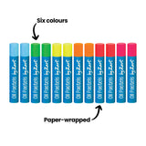 Twelve Oil Pastels by Zart arranged in a single upright row, showing fluorescent colour tips in blue, green, yellow, orange, red, and pink — two of each. An annotation reads "Six colours" with an arrow pointing to the tips, and "Paper-wrapped" pointing to the blue-labelled barrels.