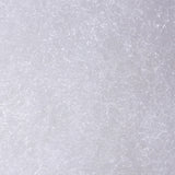 A close-up macro shot of white polyester filling, showing the loose, interwoven fibres in fine detail against a white background. Highlights the soft, lightweight texture of the filling material.