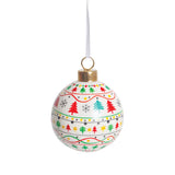 A decorated sample made using a Zart Ceramic Bauble, hand-painted with a festive pattern of red, green and teal Christmas trees, snowflakes, stars and dotted garland lines circling the white surface. A gold cap and white ribbon loop complete the finished piece.