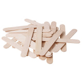 A scattered pile of Popstick Natural - Giant wooden craft sticks overlaps across a pale grey background. The oversized sticks feature rounded ends, smooth unfinished timber surfaces, and soft beige tones with visible natural grain patterns and slight colour variation throughout the wood.