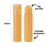 Two tan-coloured Ochre Slicks shown side by side, one capped and one with its rounded tip extended. Annotations read "8.8cm" alongside a dotted height line, "10g per stick" pointing to the tip, and "Twistable Mechanism" pointing to the ridged base.