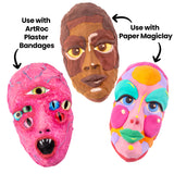 Three decorative face masks created using a female mask mould, displaying different artistic techniques. Use with ArtRoc Plaster Bandages points to a textured pink mask with multiple eyes. The centre mask features earthy brown tones with highlighted features. Use with Paper Magiclay points to a vibrant multi-coloured mask in pink, yellow, turquoise and purple.
