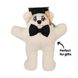 A finished calico bear decorated with black marker artwork in an anime style, wearing a black fabric bow tie and graduation cap with a colourful tassel. An annotation reads "Perfect for gifts." Demonstrates the bear's potential as a personalised keepsake.