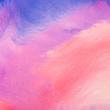 Close-up section of an oil painting showing blended pastel pink, purple, and soft coral brushstrokes. Thick textured paint layers reveal visible canvas weave and directional brush marks, demonstrating smooth colour blending and soft transitions between hues.