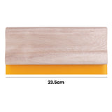 A wooden squeegee is shown in close-up, featuring a smooth pale timber handle and a straight orange rubber blade. Black annotation text “23.5cm” appears below with a dotted line indicating the width measurement across the tool.