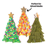 Three decorated Zart Wooden Standing Tree cut-outs standing upright. One is painted green with coiled strands of colourful beads, one has bright multicoloured brushstrokes with gold glitter dots and a glittered star, and one is covered in layered olive-green felt fringing. A black arrow reads "Perfect for Mixed Media".