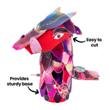 A colourful mixed media animal sculpture made from a papier-mache tube is displayed against a pale background. Iridescent overlapping paper pieces cover the tube base, while black annotation text reads “Provides sturdy base” and “Easy to cut”, highlighting creative construction features.