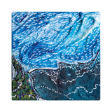 A textured painting in shades of blue and teal covers a small square canvas, with layered brushstrokes forming flowing, wave-like patterns. White dotted lines and darker accents create contrast, emphasising the tactile, raised paint on the canvas surface.