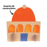 Cardboard building construction with bold text Great for 3D constructions. A curved orange roof sits above a corrugated wall with arched orange windows and a blue door. Small purple folded supports create dimension, demonstrating sturdy structure and raised, fluted texture.