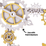 A close-up view of painted Zart Wooden Gears and Cogs Assorted pieces shows metallic silver and gold finishes applied to the laser-cut timber shapes. Black annotation text reads “Use with Paint Markers”, highlighting how the wooden pieces can be customised with colour and mixed media techniques.