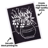 Black ink print of a floral still life, shown on white paper. Annotated text reads “Create crisp lines & high-quality prints” and “Use with block printing ink,” pointing to the clean white linework created by carving the Lino Tile Vinyl Double Sided.