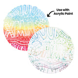 Two round prints made with a Zart Printing Foam Round overlap against a white background, beside the annotation "Use with Acrylic Paint". The upper print shows a rainbow gradient spelling "XMAS" in white negative space, while the lower print shows a pale, embossed pattern of raised dots and lines.