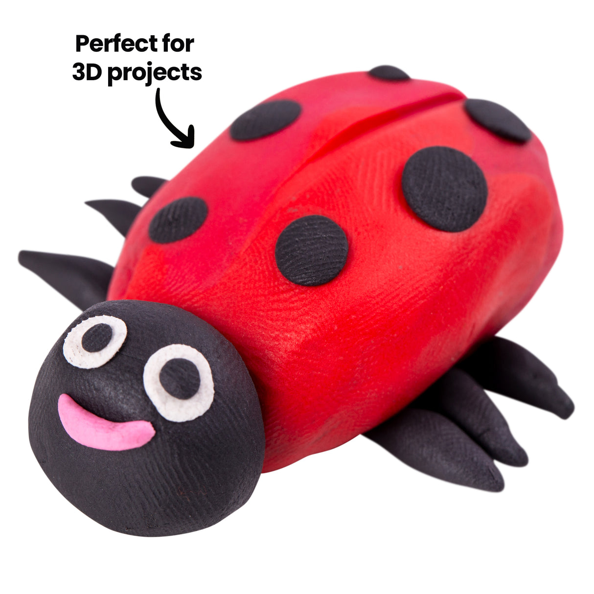 Close-up of a red Plasticine ladybird model with black spots and a black head, featuring smooth curved surfaces and a soft sheen. Fine texture from shaping is visible across the body. Annotation text reads “Perfect for 3D projects”.