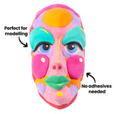 Brightly coloured sculpted face made with Zart Paper Magiclay. Annotations read “Perfect for modelling” and “No adhesives needed,” demonstrating easy shaping and self-adhering properties.