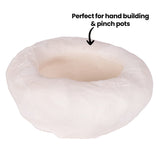 Rounded pinch pot form made from white clay with smooth interior and slightly textured exterior, with on-image text reading “Perfect for hand building & pinch pots”.