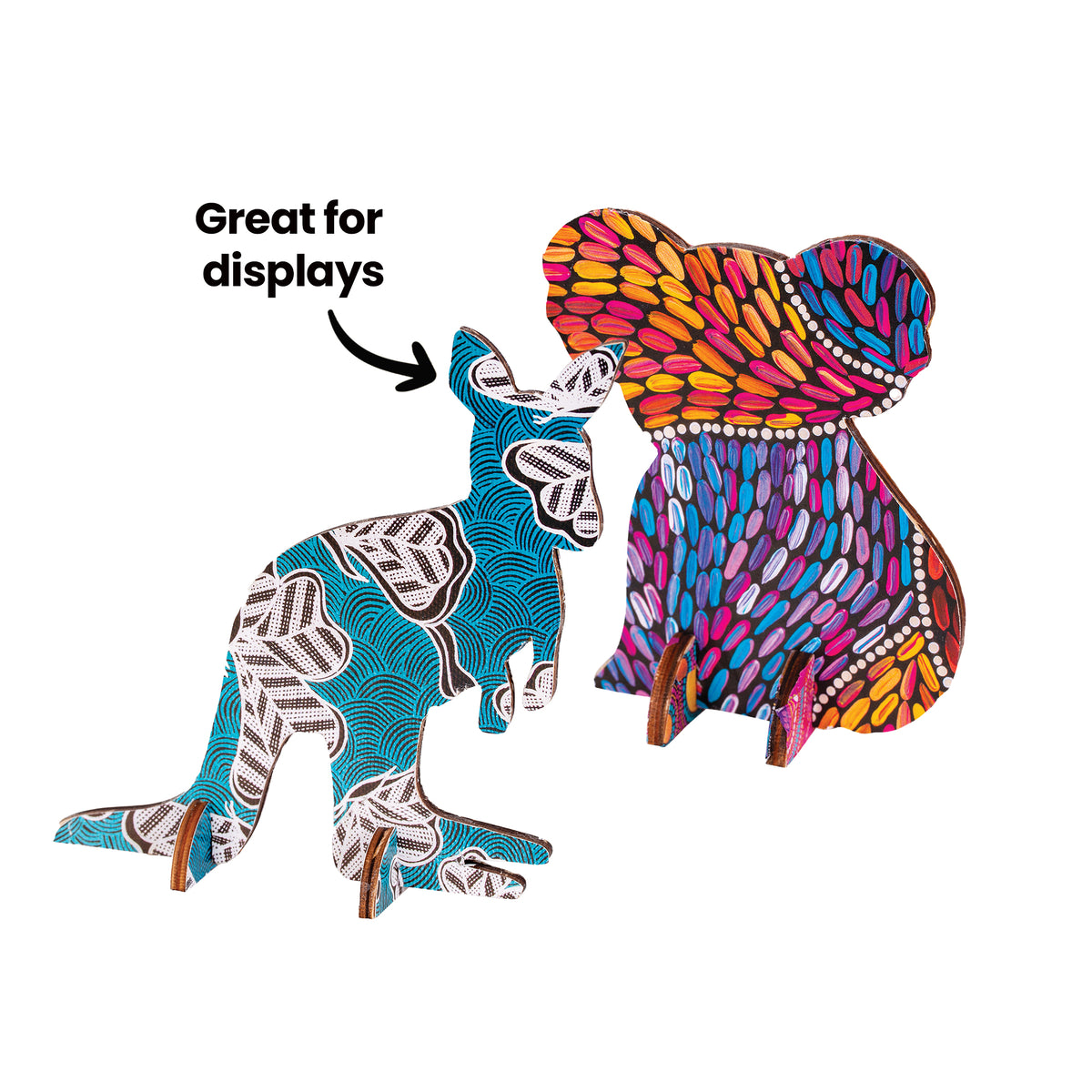 Two free-standing animal figures, a kangaroo and a koala, decorated with Zart Pattern Paper designs. The kangaroo wears a teal scallop-and-leaf pattern; the koala shows warm and cool dot-work in orange, pink, blue and purple. Both slot into bases. Annotation reads ‘Great for displays’.