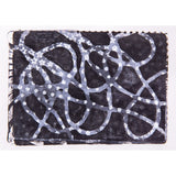 Abstract monoprint produced with a Gel Print Plate by Zart, combining black, grey and white layers. Rounded shapes, dotted trails, star-like motifs and curved lines overlap, forming a richly textured surface with varied tonal depth and a slightly irregular printed edge.