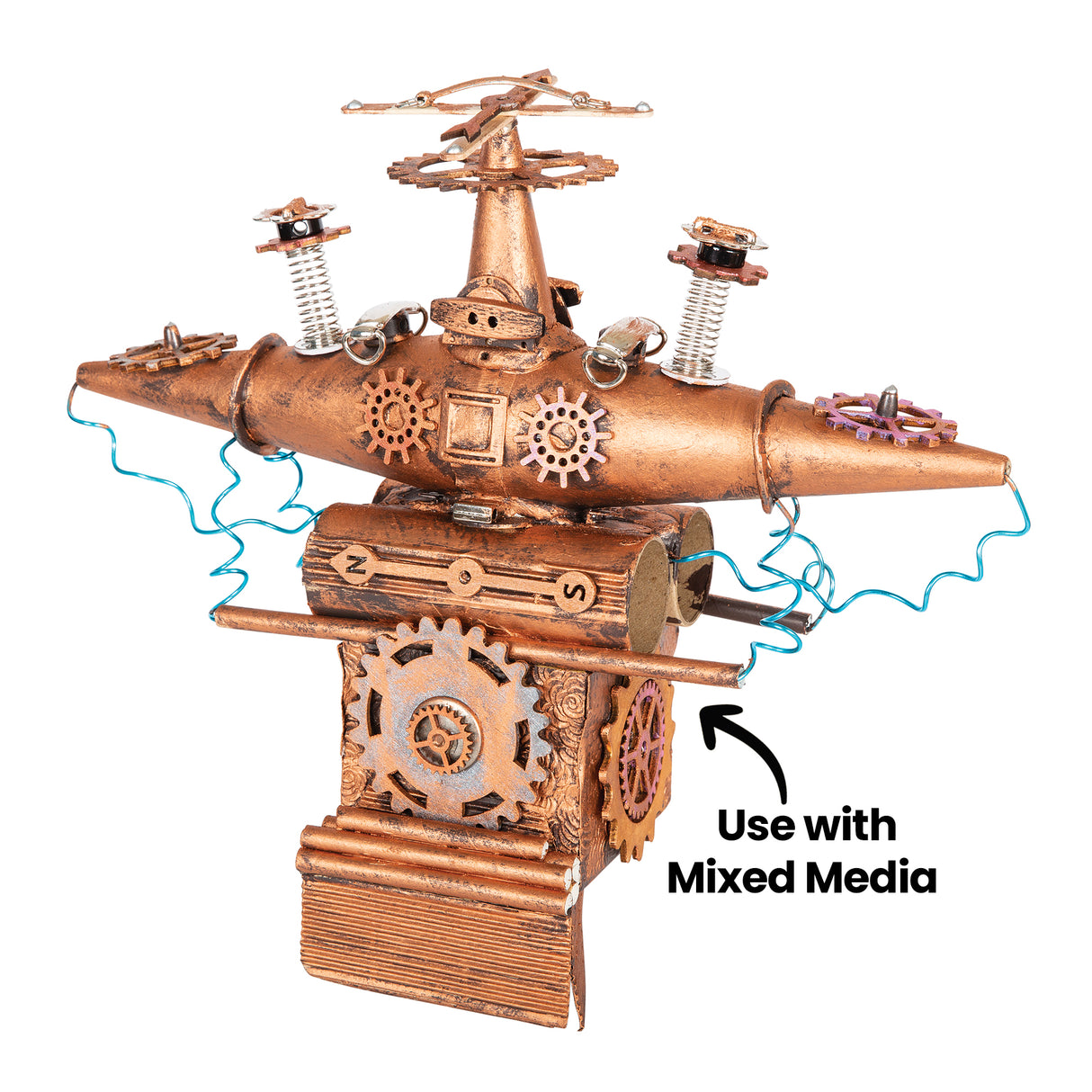 A steampunk-inspired mixed media sculpture made using Zart Wooden Gears and Cogs Assorted pieces, cardboard tubes, springs and wire is displayed against a pale background. Painted in metallic bronze tones, the artwork features layered gears and clock hands, with annotation text reading “Use with Mixed Media”.