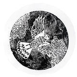 A round print made with a Zart Printing Foam Round, showing a bold black-and-white design of a bird in flight, wings spread wide against a textured black background. White linework details the feathers and tail in a raised, patterned finish, with the surrounding paper left plain white.