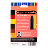 The reverse of the Zart Colours of Country Ochre Slicks packaging, showing two colour swatch strips — Australian Aboriginal Flag colours and ochre/earth tones — beside a photo of the illustrating artist. A yellow stick and black-capped stick sit alongside descriptive text panels.