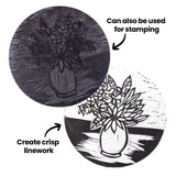 Mastercut Print Lino Round shown with a carved floral still life design and the printed result. Annotation text reads “Create crisp linework” and “Can also be used for stamping” with arrows pointing to the images. The round format suits detailed carving and stamping projects.