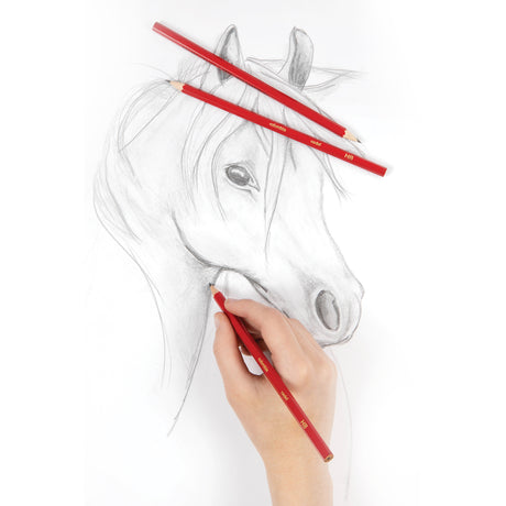 A hand holding a red Columbia Cadet HB pencil sketches a detailed horse portrait in graphite, demonstrating shading techniques on the muzzle and facial features. Two additional red hexagonal Columbia Cadet pencils rest on the artwork, showcasing the pencils' quality for detailed drawing work.