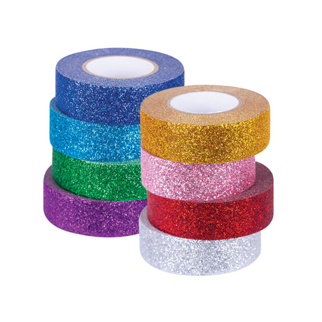 Two stacked columns of Zart Washi Tape, eight rolls total, in sparkling glitter finishes. One column shows navy blue, teal, green, and purple; the other shows gold, pink, red, and silver, each roll showing a textured, sparkly surface across its width.