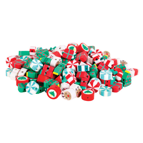 Colourful assortment of Christmas-themed silicone beads in festive red, green, and white displaying various holiday designs including candy canes, peppermint swirls, wrapped presents, Christmas trees, Santa faces, and reindeer. The beads feature pre-drilled holes for threading and crafting activities, perfect for seasonal jewellery making and decorative projects.