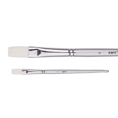A Zart Dynamic Taklon Flat Brush Size #6 shown from two angles — close-up and full length. Features a white flat taklon bristle head, chrome ferrule, and silver tapered handle labelled "6" and "zart".