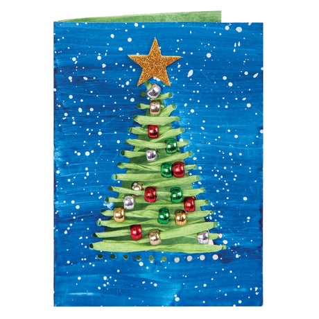 A hand-decorated card made using a Zart Stitch Cards Tree and Star card, painted in deep blue with white speckled snow. A woven green paper tree, threaded through stitched slits, is trimmed with red, green, silver and gold foil beads, topped with a glittery gold star.