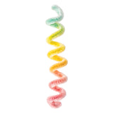 A fluffy chenille stem twisted into an S-shaped spiral, displaying a gradient colour transition from mint green at the top, through lime and bright yellow in the middle sections, to golden orange and soft coral pink at the bottom, shown against a white background.