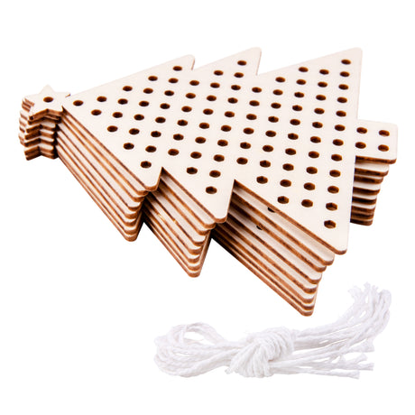 Stack of ten natural wooden Christmas tree shapes with pre-drilled holes arranged in a grid pattern for embroidery or threading activities. The layered plywood trees display visible wood grain and brown edges. White cotton thread or cord is arranged at the base of the stack, ready for weaving or stitching projects.