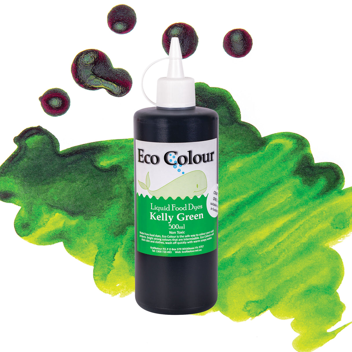 A bottle of Eco Colour Liquid Food Dyes in Kelly Green, 500ml, featuring a white pointed nozzle cap and a label showing a whale illustration. The dark green liquid is described as Non Toxic, shown against a backdrop of green and magenta watercolour splashes.