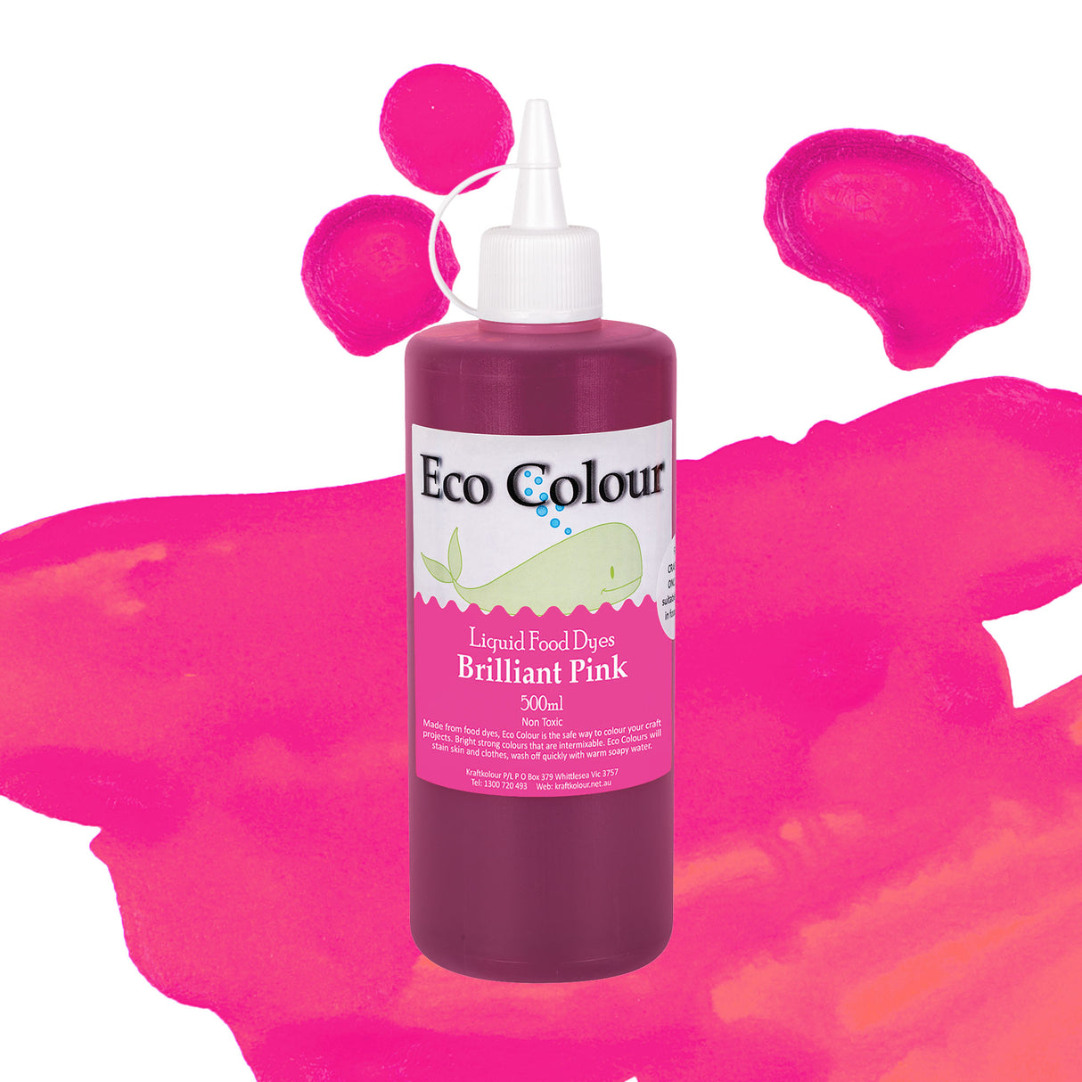A bottle of Eco Colour Liquid Food Dyes in Brilliant Pink, 500ml, featuring a white pointed nozzle cap and a label showing a whale illustration. The deep magenta liquid is described as Non Toxic, shown against a backdrop of bright pink watercolour splashes and paint blobs.